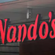 Nando's Returns to Profit After 9 Years But Warns of Tax Impact