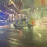 Shocking Moment: Firework Explodes Directly at Police Officers in Birmingham Street Confrontation