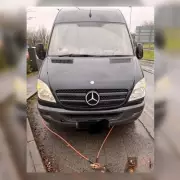 Van with more dashboard lights than Blackpool Illuminations stopped