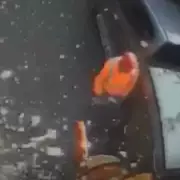 Fire Extinguisher Explodes in Bin Lorry, Showering Crew with Shards