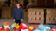 Teen's Food Drive Stuns Charity: Two Cars & Four Pallets of Donations