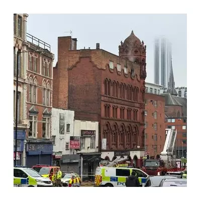 Historic Birmingham Building Fire Closes Roads, Disrupts Buses