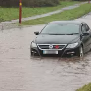 Birmingham roads submerged as snow melt and rain cause severe flooding