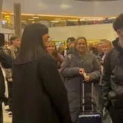Claudia Winkleman Films The Piano at Birmingham New Street Station