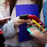 England's Schools to Implement All-Day Mobile Phone Ban Under New Government Policy