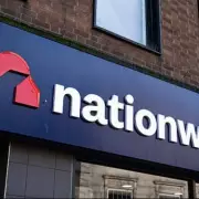 Nationwide Cuts Rates on 36 Savings Accounts After BoE Decision