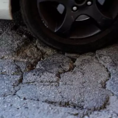 Driver Fined £70 After Pothole Damage Forces Kerb Mounting