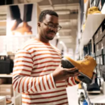 West Midlands Shopper's £9 Charity Shop Boots Revealed as £900 Designer Bargain