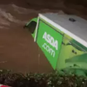 Asda Delivery Van Swept Away in Kidderminster River During Flooding
