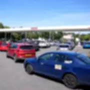 Motorists Face £200 Fines for Phone Use While Queuing at Petrol Stations