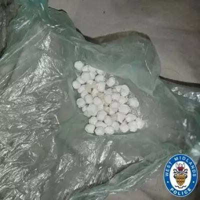 Police Raid in Birmingham: Suspect Caught Flushing Drugs Down Toilet