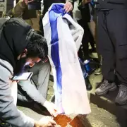 Akhmed Yakoob Questioned by Police After Israeli Flag Burned at Iran Protest