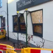 Luxury Porsche Crashes into Lichfield Pub, Injuring Patron and Forcing Closure