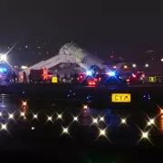 Two Dead After Air Canada Plane Collides with Fire Truck at New York's LaGuardia Airport