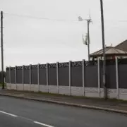 UK Households Face Garden Fence Demolition Over Colour Disputes