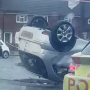 Woman and Child Hospitalised After Wednesbury Crash Leaves Car Overturned