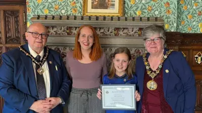 10-Year-Old Dribbles Football 10 Miles for Team Fundraiser