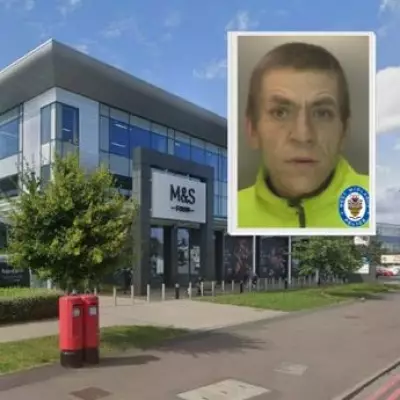 Police Hunt Suspect in Birmingham M&S Robbery and Assault Case