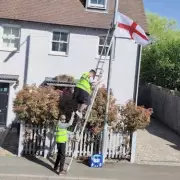 Tattoo Artist Faces Vile Abuse After Confronting Flag Hangers