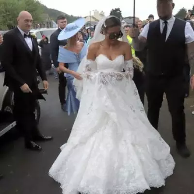 Venezuela Fury Wears White Fishtail Dress and Crocs to Church Wedding