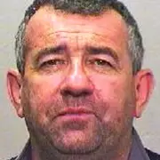 Killer gets four more years for slashing 'Godfather' inmate's neck