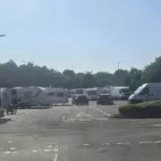 Travellers set up camp on car park near B&Q and IKEA in Wednesbury