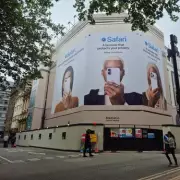 What giant ads near Birmingham Cathedral hide and when they'll go