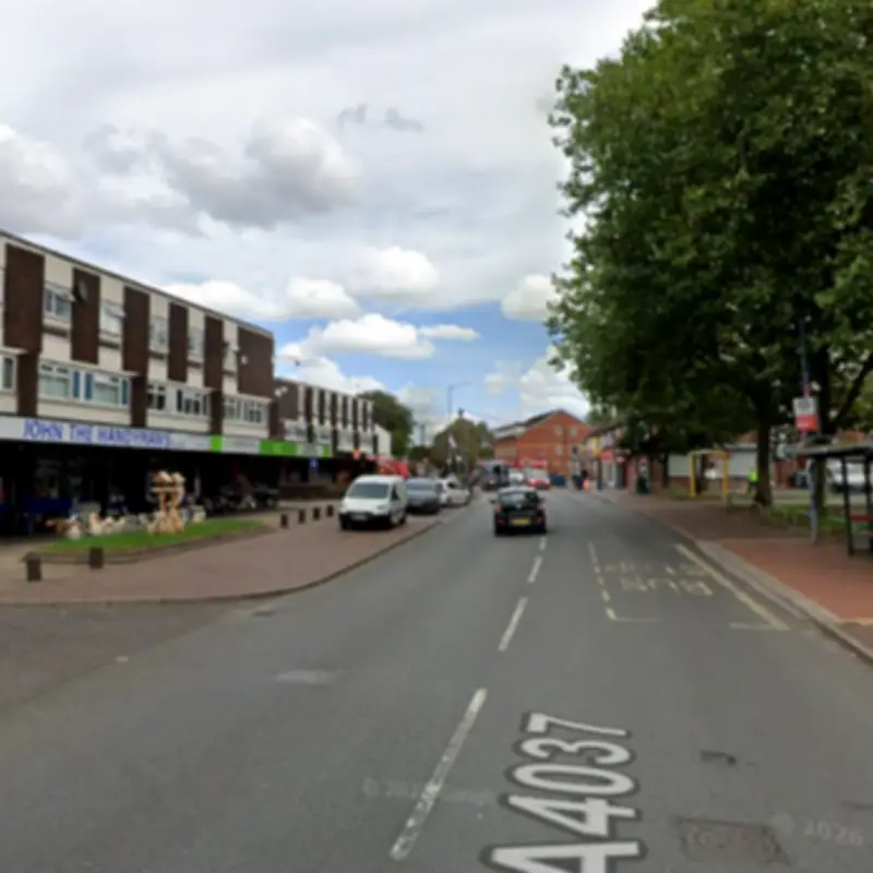 Man dies after car crashes into building in Tipton, six injured