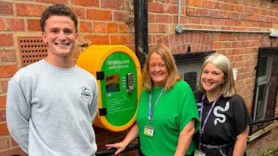 Life-saving defibrillator installed outside Stockport carers charity