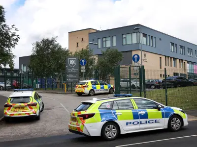 Teen, 14, in court over triple stabbing at Manchester school