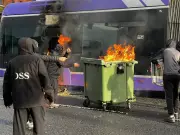 Belfast Bus Set on Fire During Anti-Immigration Protest After Knife Attack