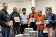 Staff Unite to Support People in Need with Literacy Kit Drive