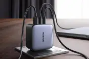 Travel Gadget Frees Up Suitcase Space, Charges Three Devices