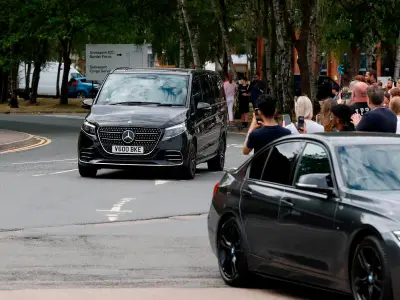 England World Cup squad land at Birmingham Airport as fans line streets