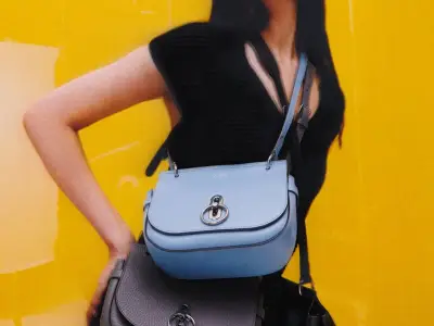 Mulberry Shares Rise as Luxury Handbag Maker Cuts Losses to £8.9m