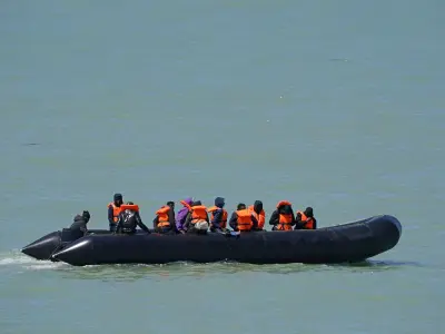 Record 165 Migrants Cross Channel in Single Boat as Peril Grows