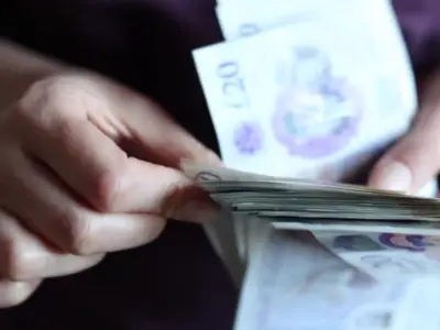 UK Workers Urged to Check Payslip Code for Potential £689 Refund