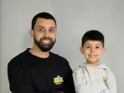Birmingham Father-Son Duo Give Away 200 Books for Children's Speech Challenges