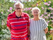 Elderly Couple Face £1,000 Bill for Planting Flowers on Developer-Owned Land