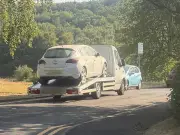 Police stop uninsured M6 pick-up truck carrying stolen car from London