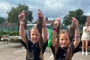Seven-Year-Old Twins Raise Over £4,000 With First Haircuts For Charity