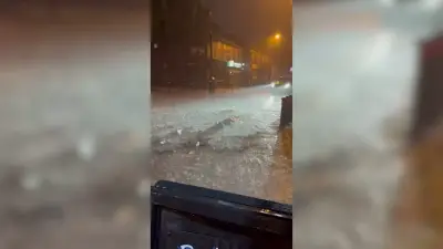 Wall of water rips up road outside Burntwood pub as storm hits