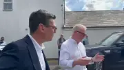 Burnham visits Stourbridge fire scene, pledges emergency funds