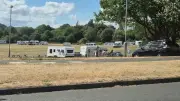 Caravans on Quinton park as travellers arrive with horses