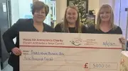 Denbighshire Memorial Park Staff Donate £5,000 to Wales Air Ambulance