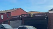 Man arrested after car rams Alum Rock shop shutters