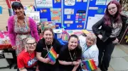 NHS staff show support at Stockport Pride with stall and glitter bar