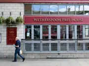 Wetherspoons bans loudspeaker calls and music in UK-first crackdown