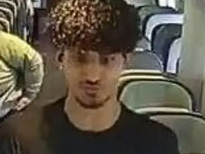 Woman punched twice on train and abused at Coventry station